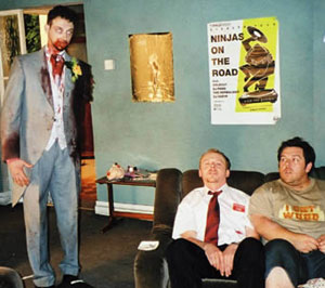 The gentleman playing the zombie is an amputee who had to wear a prosthetic arm when seen in the corner shop earlier in the film.